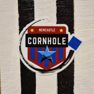 Presenting a cheque to Newcastle Cornhole Club