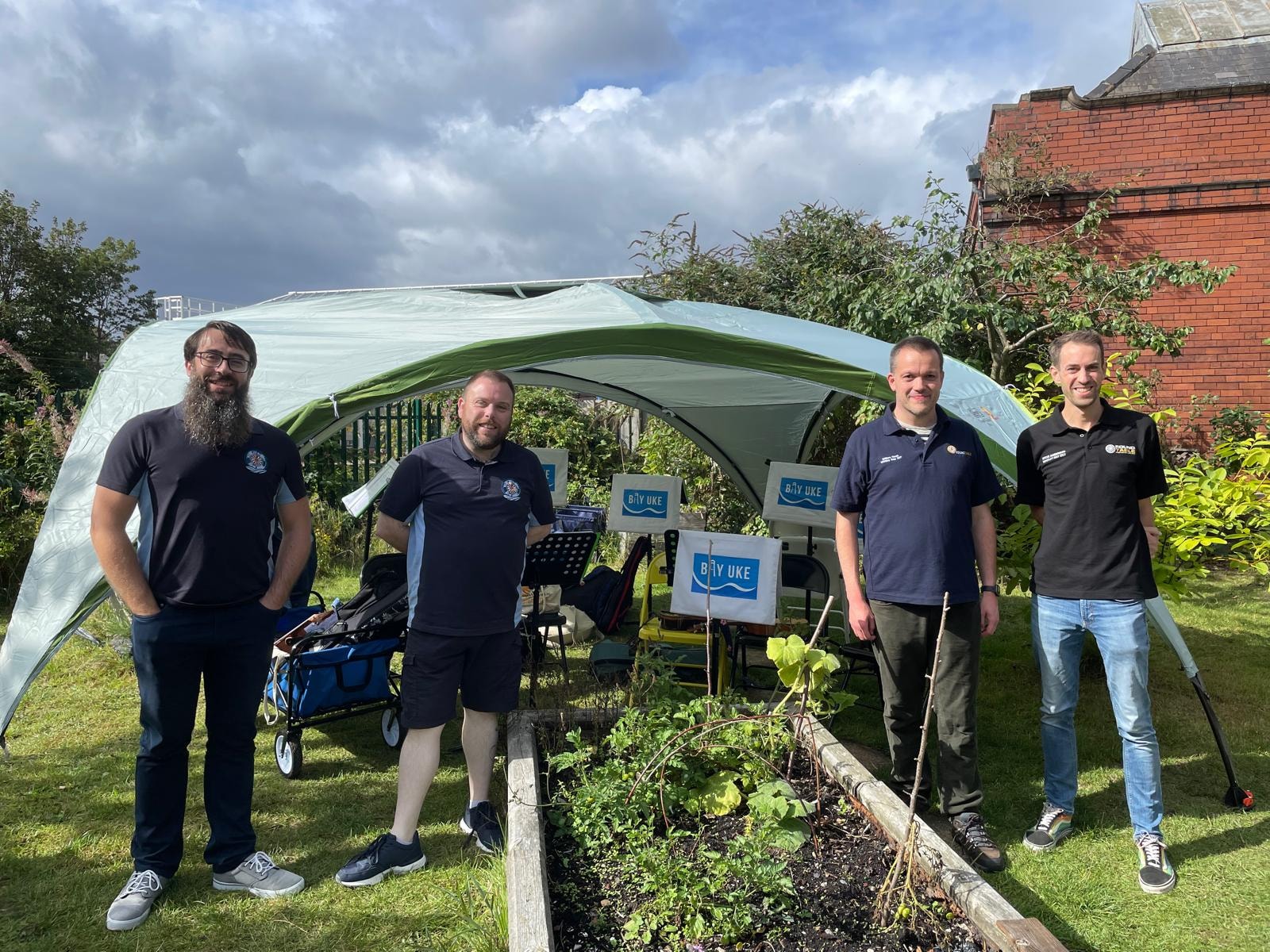 Presenting a cheque to The Station Master's Community Garden